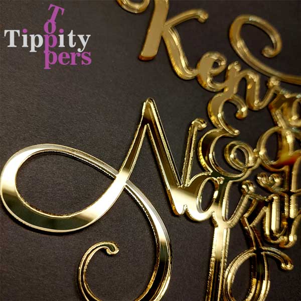 Wedding cake topper in acrylic with couple names