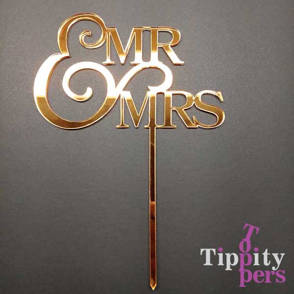 Personalized Mr&Mrs wedding cake topper with last name, made from laser-cut mirror gold acrylic