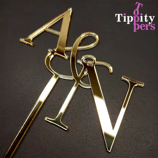 Acrylic monogram cake topper for wedding engagement or anniversary