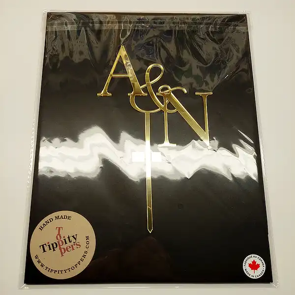 Monogram laser cut wedding cake topper in acrylic