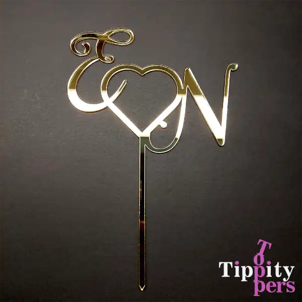 Cake topper de mariage en acrylique personnalisé avec le initiales des couples reliées à un coeur