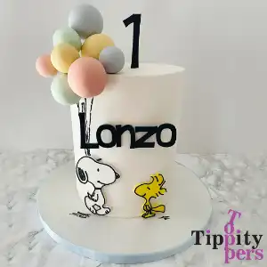 Name Caharm and Number Topper in black satin acrylic for 1st birthday cake