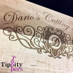 Personalized laser engraved cutting board with monogram and name