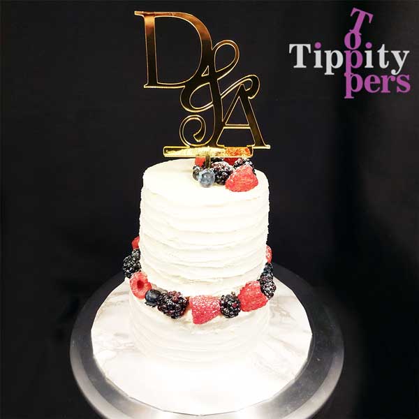 Monograms laser cut wedding cake topper in acrylic